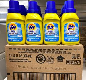 lot 13 image: Tide Laundry Detergent, 10 oz x 12