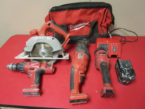 lot 233 image: MILWAUKEE CORDLESS 18V CIRCULAR SAW, SAWZALL, 12 DRILL, WORK LIGHT, BATTERY AND CHARGER, BAG