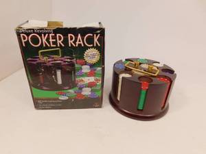 lot 104 image: Deluxe Revolving Poker Rack