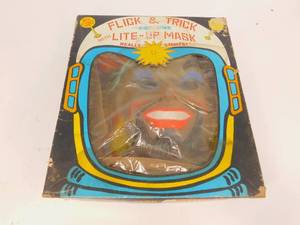 lot 105 image: Flick & Trick Costume with Lite-up Mask (Space Explorer)