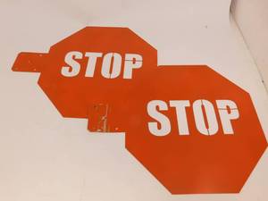 lot 108 image: 2 Metal Orange Octagon Stop Signs