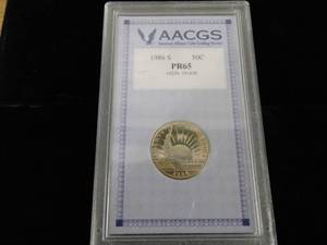 lot 56 image: 1986 S Proof Liberty Half Dollar