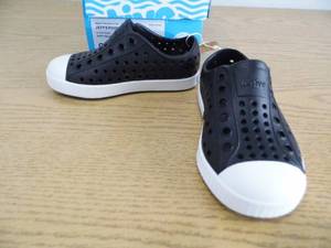 lot 82 image: Childs Native Brand Shoes