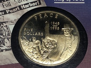 lot 12 image: 1995 World War II Victory In Europe Commemorative Coin & Stamp Set