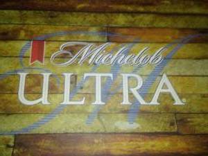 lot 16 image: Michelob Ultra table 24 x 24 x 30 commercial grade, heavy base,