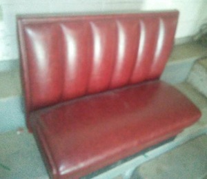 lot 22 image: single Booth , 45 Long, 24 deep, 36 tall. All matching vinyl. Solid condition. Normal wear.