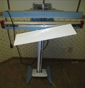lot 102 image: Uline Heat Sealer...