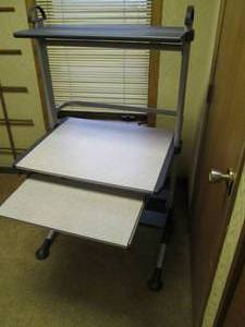 lot 173 image: Office Desk Stand On Wheels...