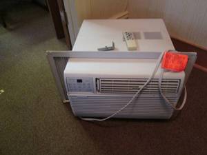 lot 193 image: Kenmore Air Conditioner With Remote...