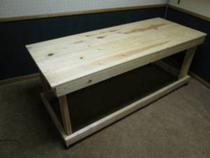 lot 195 image: Handmade Solid Wood Stand on Wheels...