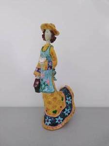 lot 42 image: Statue of Woman with Bird