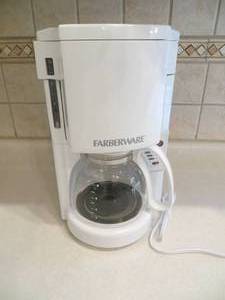 lot 70 image: White Farberware Coffeepot