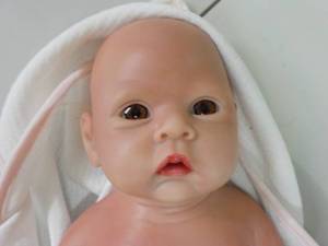 lot 51 image: Real Baby Doll 20 long...