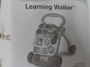 lot 66 image: Vtech Sit - to- Stand Learning Walk...
