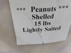 lot 102 image: 15 lb. Pail of Lighted Salted Peanu...