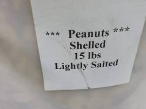 lot 103 image: 15 lb. Pail of Lighted Salted Peanu...