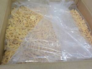 lot 121 image: 23 lb. Box of Cheddar Cheese Soy Ne...