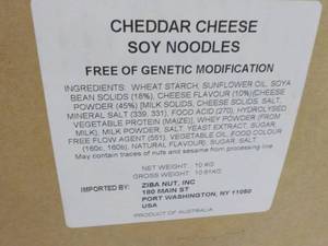 lot 126 image: 23 lb. Box of Cheddar Cheese Soy Ne...