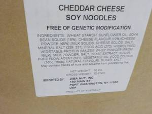 lot 127 image: 23 lb. Box of Cheddar Cheese Soy Ne...