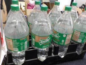 lot 148 image: 8 - 2 liters Bottles Spite Ginger...