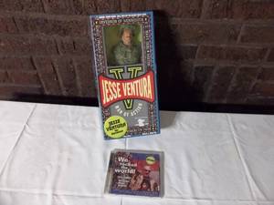 lot 18 image: Jesse Ventura Doll & CD