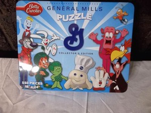 lot 26 image: General Mills Jigsaw PuzzleMetal Tin