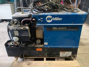 lot 35 image: Miller Legend ACDC Welder Onan 18XSL Generator