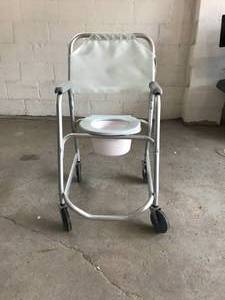 lot 10 image: Over The Toilet Shower Bedside Commode on Wheels - With Lifting Seat & Removable Bucket...Looks New