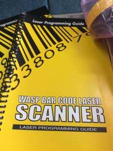 lot 54 image: Lot Of 3 NEW In Package Wasp Bar Code Laser Scanners and Laser Programming Guides