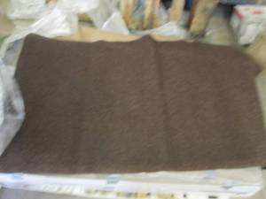 lot 125 image: 33x56 Brown Mat one unfinished edge...