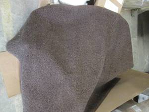 lot 126 image: 33x56 Brown Mat one unfinished edge...