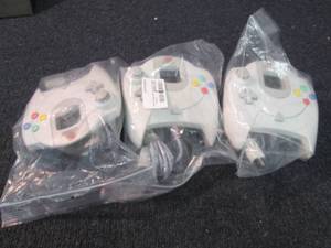 lot 173 image: 3 Saga Dreamcast Game Controllers...
