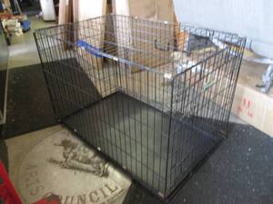lot 51 image: Large Remington Portable Pet Kennel...