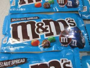 lot 162 image: 11 Bags of Hazelnut Spread M&Ms Be...