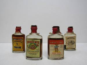 lot 59 image: 4 Vintage 1940s Novelty Whiskey Bottles