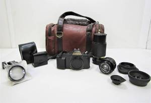 lot 137 image: Vintage CANON T50 Film Camera wZoom Lenses, Case & Accessories
