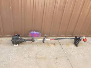 lot 2 image: Craftsman 2 cycle weed trimmer. Lightly used. Tested & works. As shown.