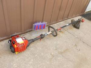 lot 4 image: Craftsman 4 cycle weed trimmer. Lightly used. Tested & works. As shown.
