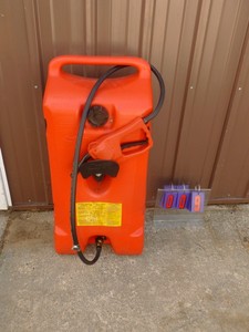 lot 9 image: 14 Gallon Gas Caddy. Looks in good condition. As shown.