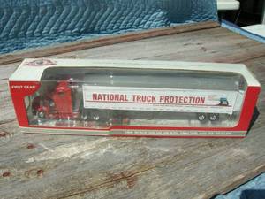 lot 97 image: First Gear 164 Volvo VN670 Tractor, Trailer