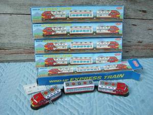 lot 10 image: 5 Schylling Wind-up Express Train Sets
