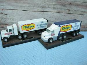 lot 17 image: Two Vintage Nylint Rhodes Semi-Truck TrophyAward