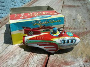 lot 20 image: Rocket Racer Friction Tin Toy