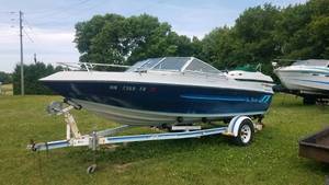 lot 2 image: 1984 Sea Sprite 20 foot open bow boat with a Mericruiser 260 hp V8 motor