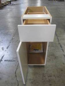 lot 213 image: Hampton Bay Benton Assembled 12x34.5x24.5 in. Base Cabinet with Soft Close Full Extension Drawer in White BT1235B-WH