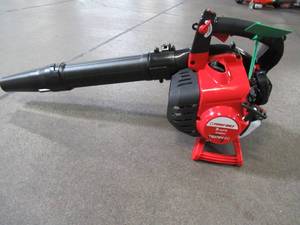 lot 14 image: Troy-Bilt 150 MPH 450 CFM 2-Cycle 27cc Gas Handheld Leaf Blower with VacuumMulch Kit and JumpStart Capabilities, TB27BV EC - Starts and Shortly Dies