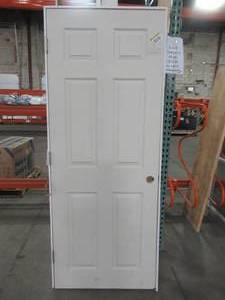 lot 609 image: ProCore 30 x 78 (approximate) 6 Panel, Solid Core Door Slab. - Some scratches, broken jamb. Slab is in nice condition