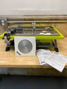 lot 21 image: RYOBI 7 in. 4.8 Amp Tabletop Tile Saw