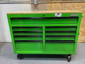 lot 25 image: INTERNATIONAL 46 in. W x 24.5 in. D 9-Drawer Tool Chest Mobile Workbench with Solid Wood Top in Green