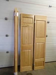 lot 78 image: Bi Fold Closet Door with Trim Boards